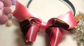 Tiara rosa e marrom